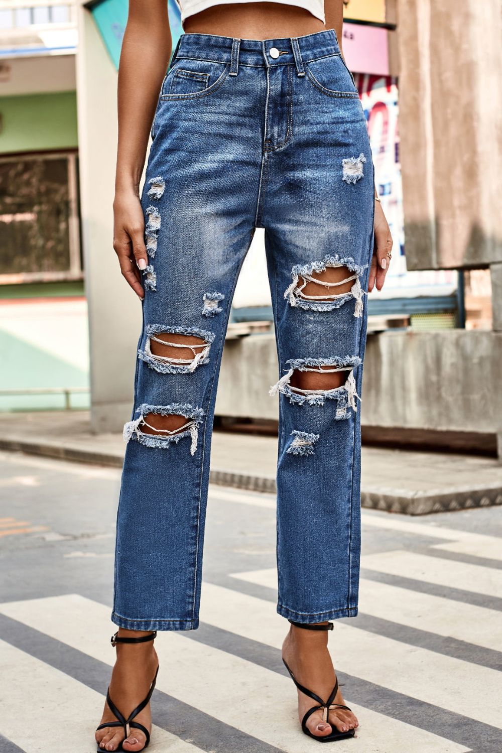 Distressed Buttoned Jeans with Pockets - Charming Charlie Main image